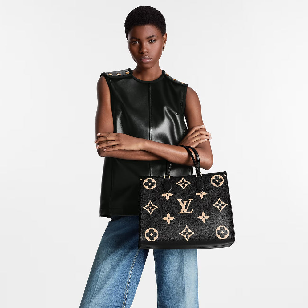 ON THE GO MM VINTAGE PRE LOVED HANDBAG BY LOUIS VUITTON