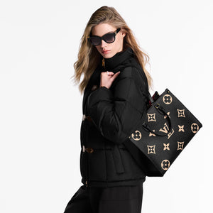 ON THE GO MM VINTAGE PRE LOVED HANDBAG BY LOUIS VUITTON